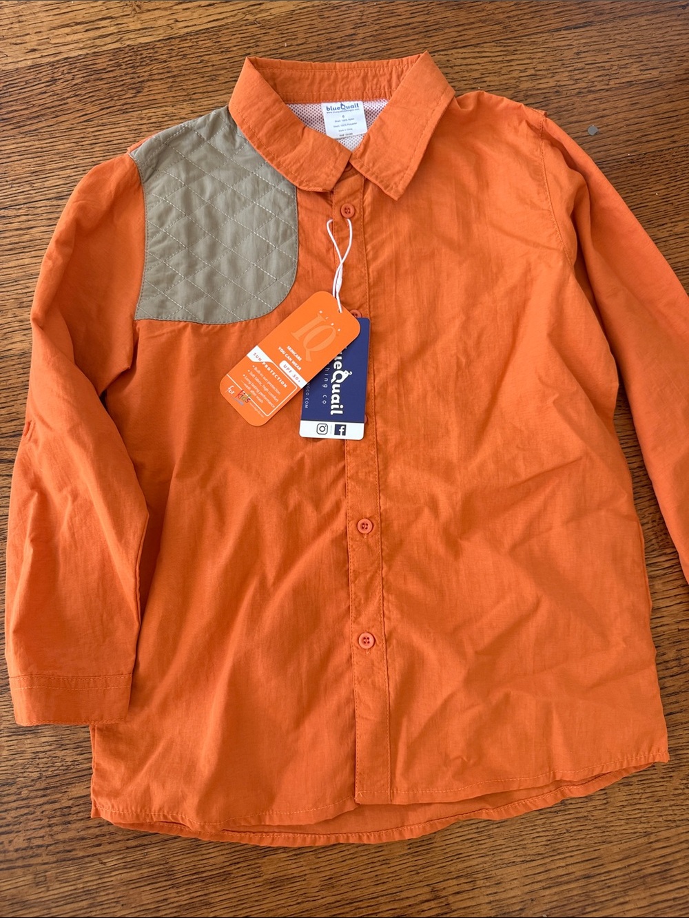 Orange Button-Up Shirt with Quilted Tan Shoulder Patch